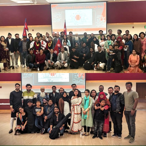 The image is a composite of two group photographs taken at what appears to be an event, likely celebrating International Mother Language Day. In both photos, a large group of people stand and sit together in a spacious room with a red and beige color theme.  Top Photo:  The group is composed of diverse individuals, both men and women, wearing various traditional and modern outfits. Several people are holding Nepalese flags. In the background, there is a large projector screen displaying “International Mother Language Day” in bold text along with additional text in English and what appears to be other scripts. The screen also has some graphical elements. Bottom Photo:  Another group of people pose for the camera, standing and sitting together. The attire is similarly diverse, with many participants wearing traditional clothing. The same projector screen is visible in the background, displaying similar text and graphics related to International Mother Language Day as in the top photo.